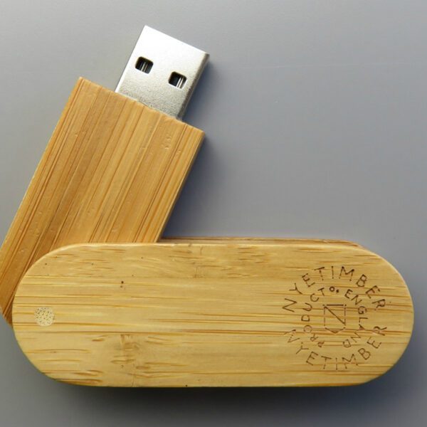 Wooden USB with NyeTimber engraved logo on grey background