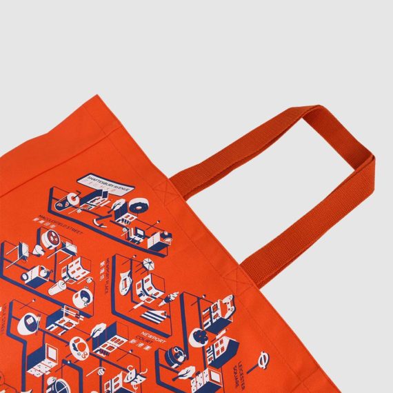 orange tote bag and handles with detailed London street print