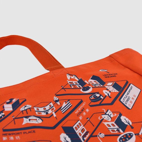 orange tote bag with detailed London street print