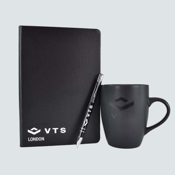Black notebook, pen and mug with white VTS print